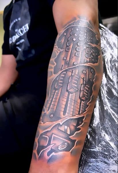 Biomechanical + Black & Grey machinery tattoo on Upper Arm by Capital_City_Art_Loft on TattMe