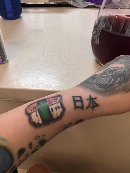 New School + Lettering sushi tattoo on Forearm by Siren_Tattoo on TattMe