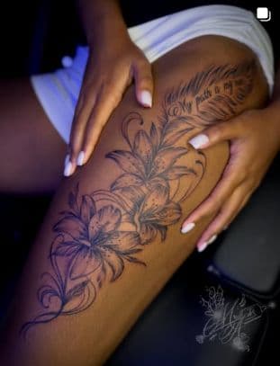 Black & Grey + Floral lilies tattoo on Thigh by MauniiTheIllustrator on TattMe
