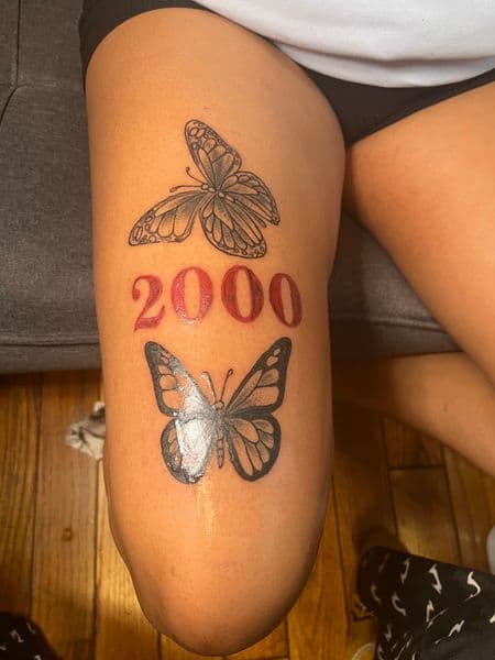 Fine Line + Lettering butterflies tattoo on Thigh by InkedByNaireea on TattMe