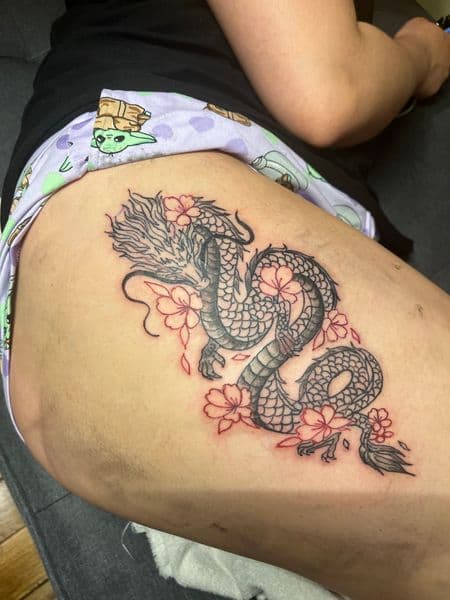 Japanese + Black & Grey dragon tattoo on Thigh by InkedByNaireea on TattMe