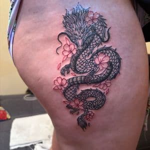 Traditional dragon tattoo on Thigh by InkedByNaireea on TattMe