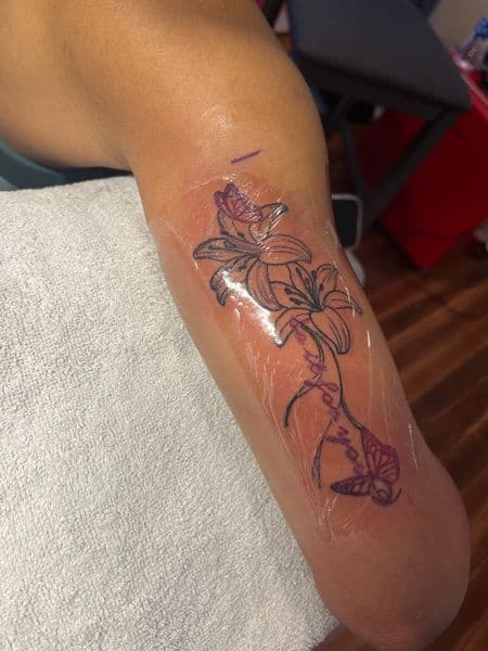 Floral + Fine Line flowers tattoo on Forearm by InkedByNaireea on TattMe