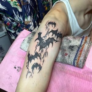 Minimalist bats tattoo on Upper Arm by InkedByNaireea on TattMe