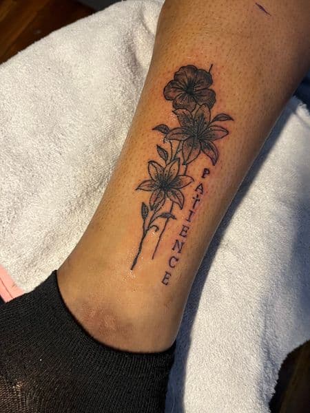 Floral + Black & Grey flowers tattoo on Calf by InkedByNaireea on TattMe