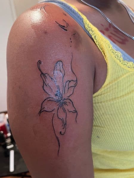 Fine Line + Floral flower tattoo on Upper Arm by InkedByNaireea on TattMe