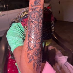 Floral + Black-work butterflies tattoo on Half Sleeve by InkedByNaireea on TattMe