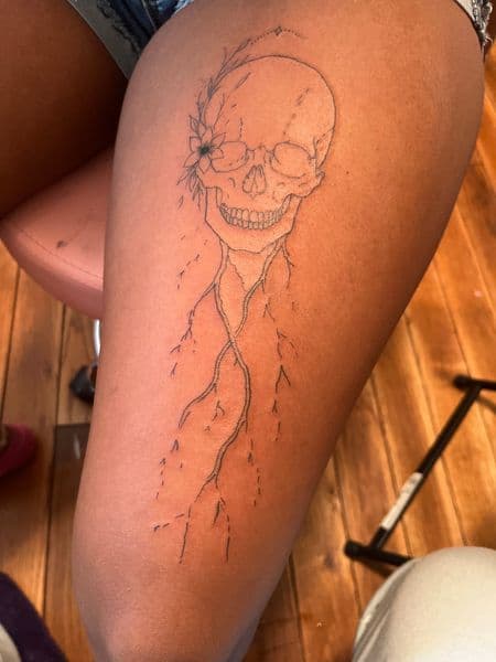 Fine Line + Floral skull tattoo on Thigh by InkedByNaireea on TattMe