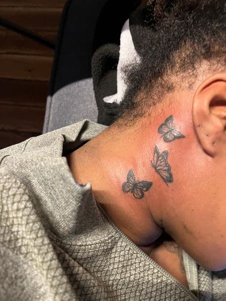 Fine Line + Black-work butterflies tattoo on Neck (Side) by InkedByNaireea on TattMe