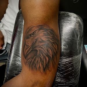 Black & Grey + Illustrative eagle tattoo on Upper Arm by Officialdetailedink on TattMe