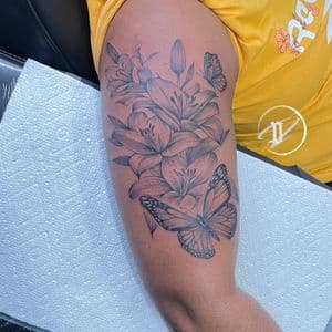 Black & Grey + Floral flowers tattoo on Upper Arm by Officialdetailedink on TattMe