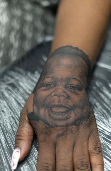 Portrait + Black & Grey baby tattoo on Hand by Callme_Lroy on TattMe