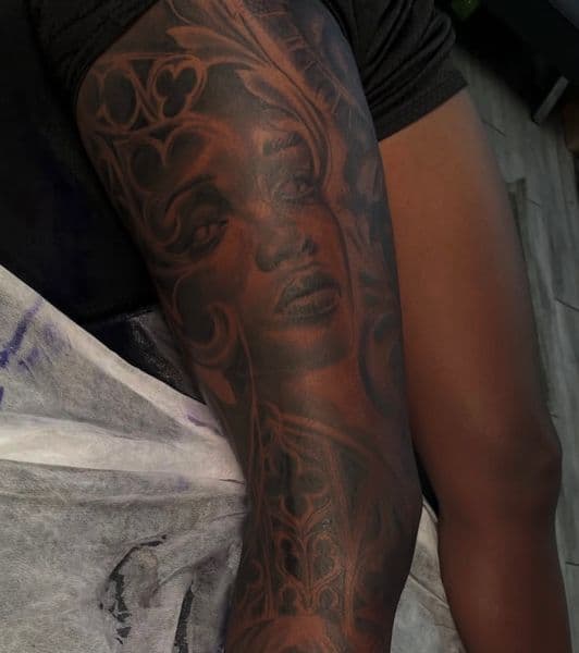 Black & Grey + Realism woman tattoo on Thigh by Tattedbyd on TattMe