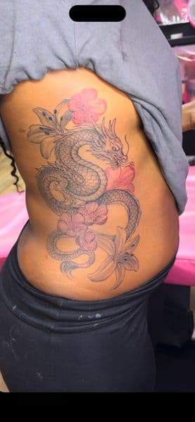 Japanese + Floral dragon tattoo on Ribs by tough_ink on TattMe