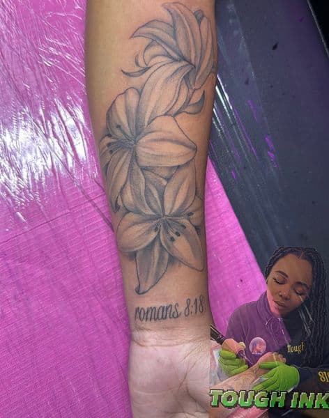 Black & Grey + Floral lilies tattoo on Forearm by tough_ink on TattMe