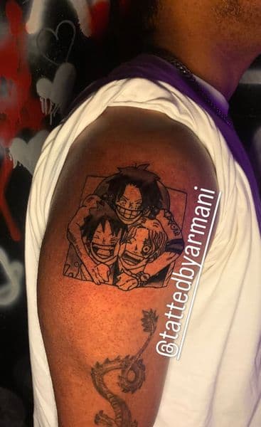 Anime + Black-work one piece tattoo on Upper Arm by Quiet_Tattoo_Artist on TattMe