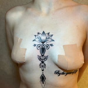 Floral + Black & Grey lotus tattoo on Sternum by GraceSolArt on TattMe