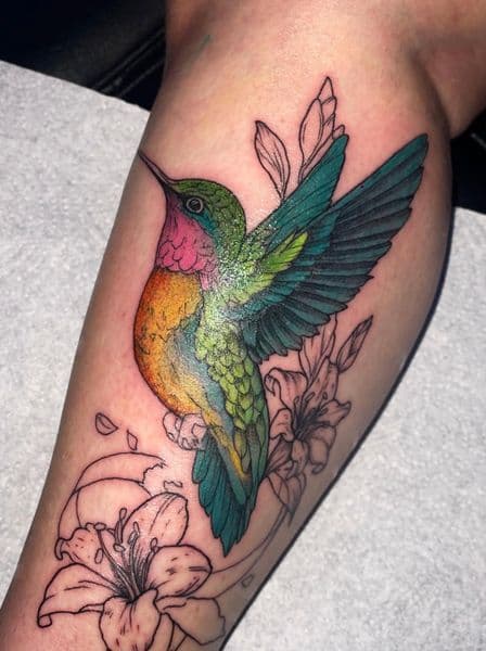 Color + Illustrative hummingbird tattoo on Calf by Visionaryinkstudios on TattMe