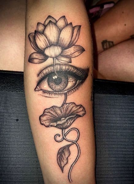 Black & Grey + Illustrative lotus tattoo on Forearm by Visionaryinkstudios on TattMe