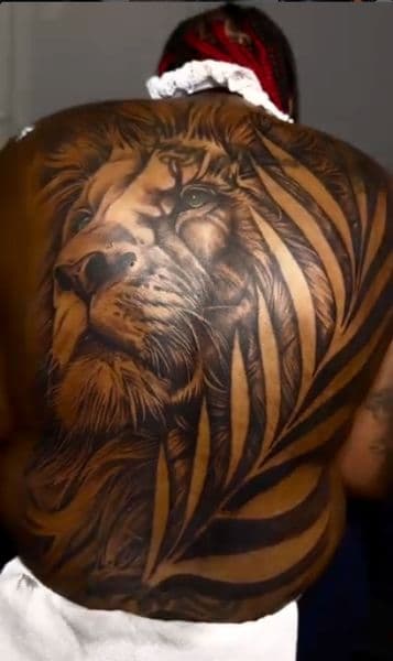 Realism + Black & Grey lion tattoo on Upper Back by IK_INK on TattMe