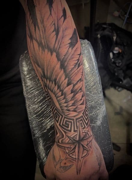 Black & Grey + Realism feathers tattoo on Forearm by Inked_By_Tk on TattMe