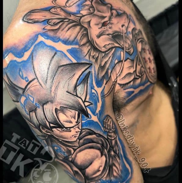 Anime + Illustrative goku tattoo on Upper Arm by Inked_By_Tk on TattMe