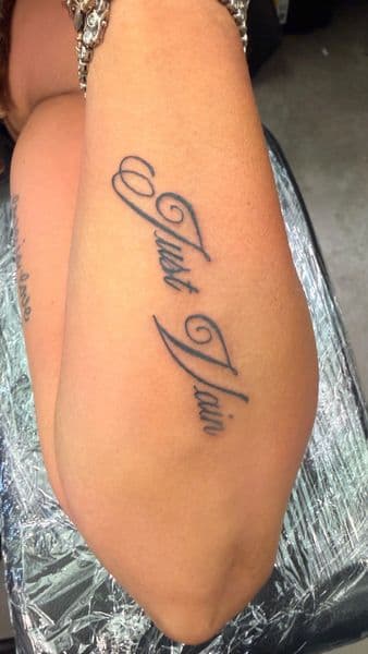 Script + Lettering words tattoo on Upper Arm by Inked_By_Tk on TattMe