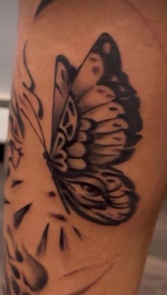Black & Grey + Illustrative butterfly tattoo on Upper Arm by Lavan_Wright on TattMe