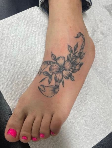 Black & Grey + Floral scorpion tattoo on Foot by Dre_Bullock on TattMe