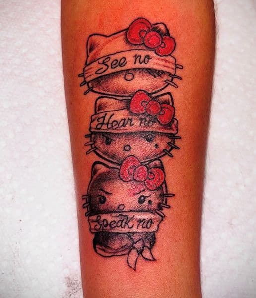 Black & Grey + Color hello kitty tattoo on Forearm by Dre_Bullock on TattMe