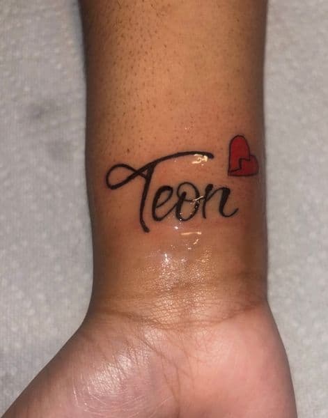 Script + Lettering lettering tattoo on Wrist by Dre_Bullock on TattMe
