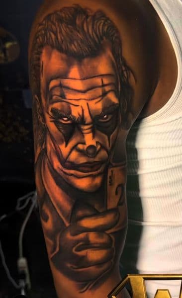 Realism + Black & Grey joker tattoo on Upper Arm by Wrexx_Art on TattMe