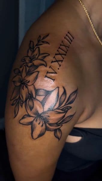 Black & Grey + Floral lilies tattoo on Shoulder by Armarta_Gibbs on TattMe