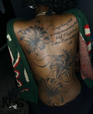 Black & Grey + Floral lily tattoo on Upper Back by Armarta_Gibbs on TattMe