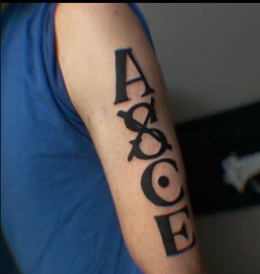 Lettering + Black-work lettering tattoo on Upper Arm by Jay_Jones_Bird on TattMe