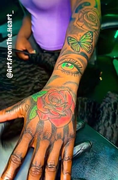 Color + Illustrative rose tattoo on Hand by DaBreon_Woods on TattMe