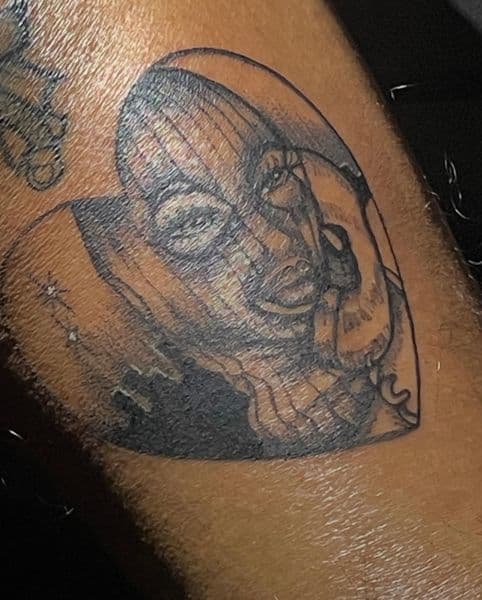 Black & Grey + Illustrative heart tattoo on Upper Arm by Maya_Johnson on TattMe