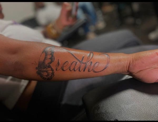 Script + Black & Grey butterfly tattoo on Forearm by Maya_Johnson on TattMe