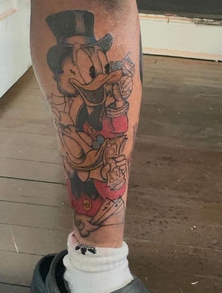 Cartoon + Pop Culture scrooge mcduck tattoo on Calf by Maya_Johnson on TattMe