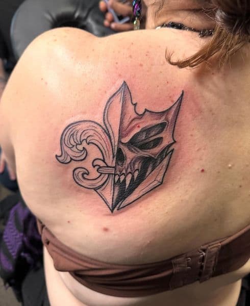 Black & Grey + Illustrative fleur de lis tattoo on Shoulder Blade by Ray on TattMe