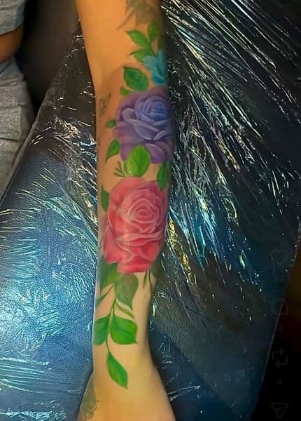 Color + Floral roses tattoo on Forearm by Drunkenn_Monkeyy on TattMe