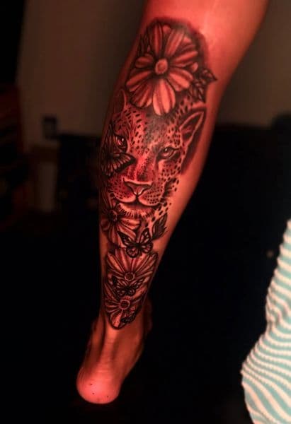 Black & Grey + Illustrative leopard tattoo on Calf by Rell on TattMe