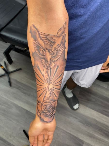 Black & Grey + Illustrative doves tattoo on Forearm by Trill.Tattoos on TattMe