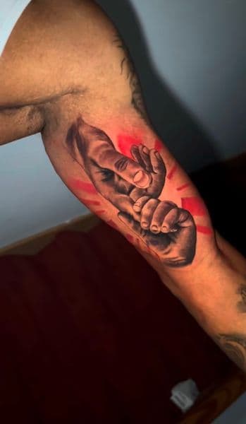 Realism + Black & Grey hands tattoo on Upper Arm by Nigel_Uno on TattMe