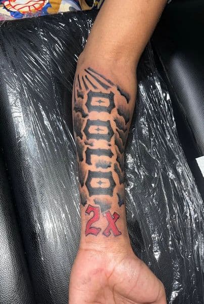 Black & Grey + Lettering spine tattoo on Forearm by Deshan_Potts on TattMe