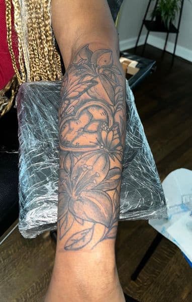 Black & Grey + Illustrative flowers tattoo on Forearm by Deshan_Potts on TattMe