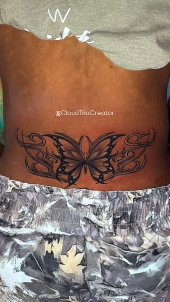 Black & Grey + Illustrative butterfly tattoo on Lower Back by ClaudThaCreeator on TattMe