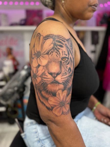 Black & Grey + Realism tiger tattoo on Upper Arm by ClaudThaCreeator on TattMe