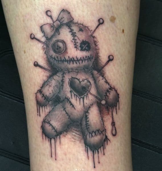 Black & Grey + Illustrative voodoo doll tattoo on Calf by InkByWayne on TattMe