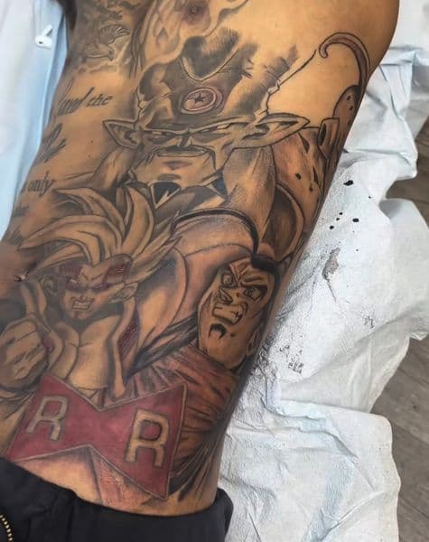 Anime + Pop Culture goku tattoo on Ribs by gawddy on TattMe